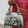 Bolso hebillas piel brillos plata