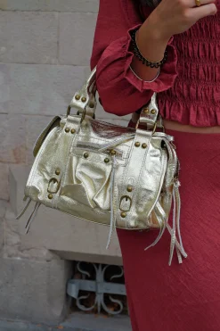 Bolso hebillas piel brillos dorado