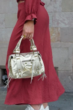 Bolso hebillas piel brillos dorado
