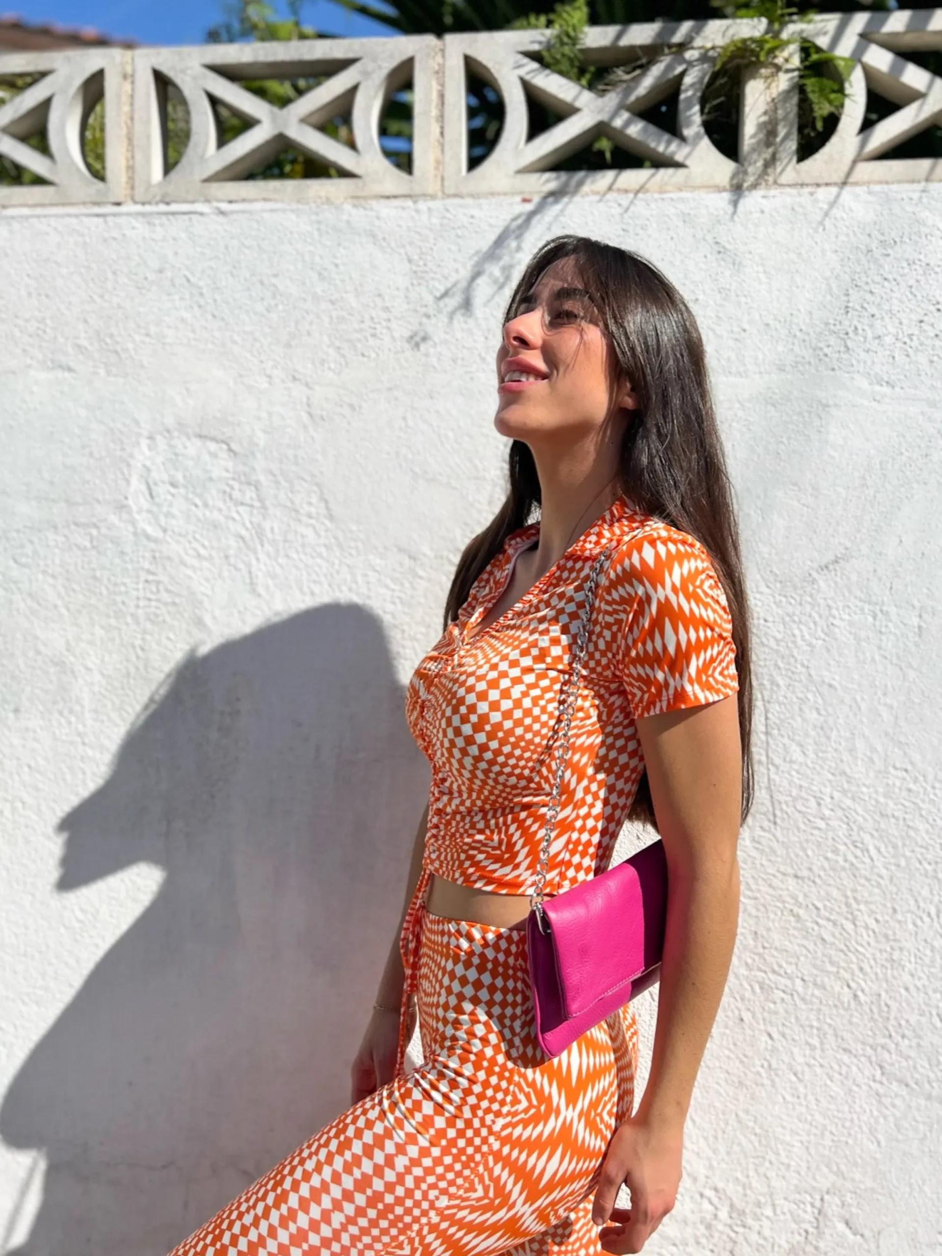 Bolso piel cadenas fucsia