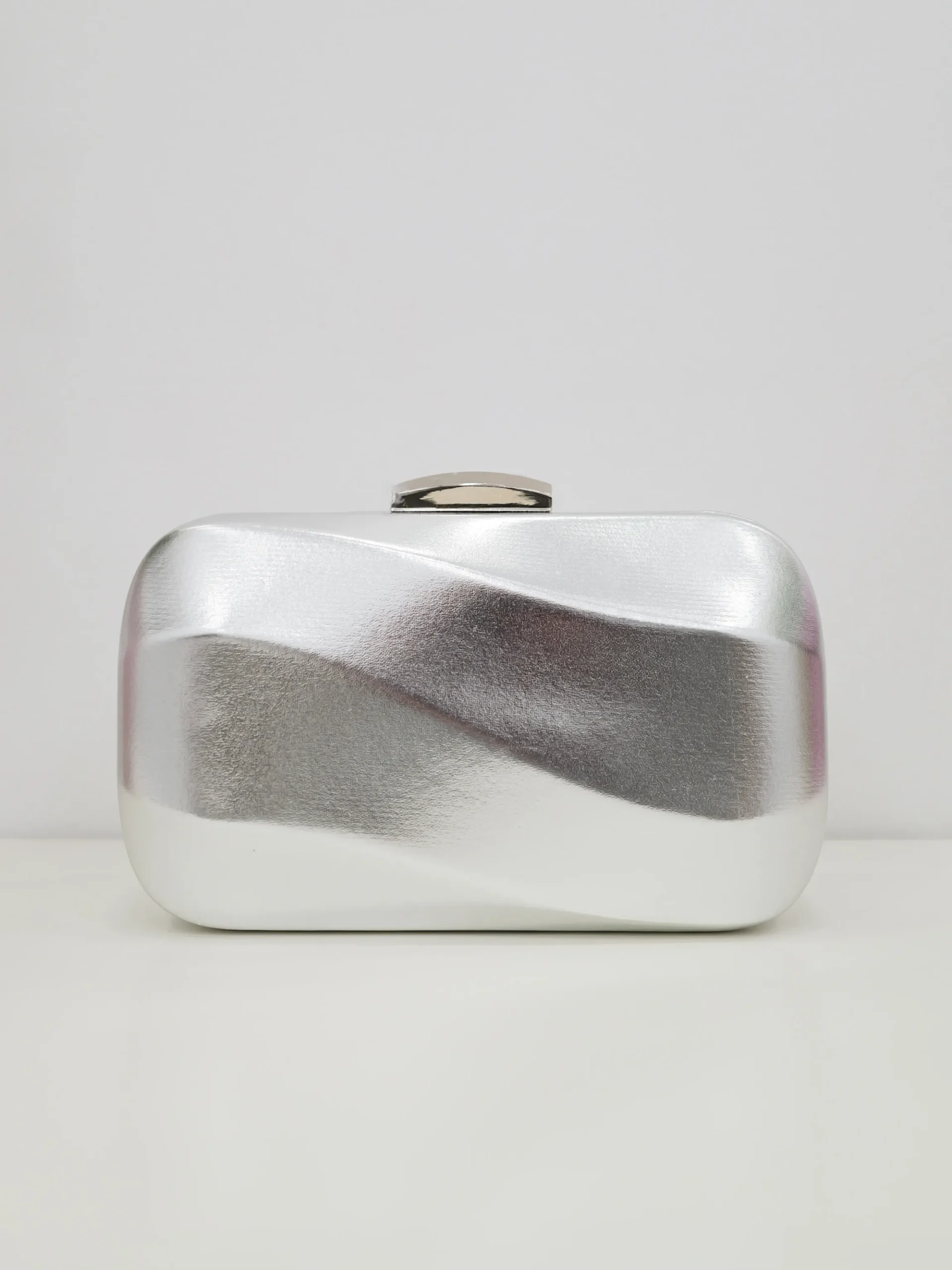 Clutch efecto ola plata