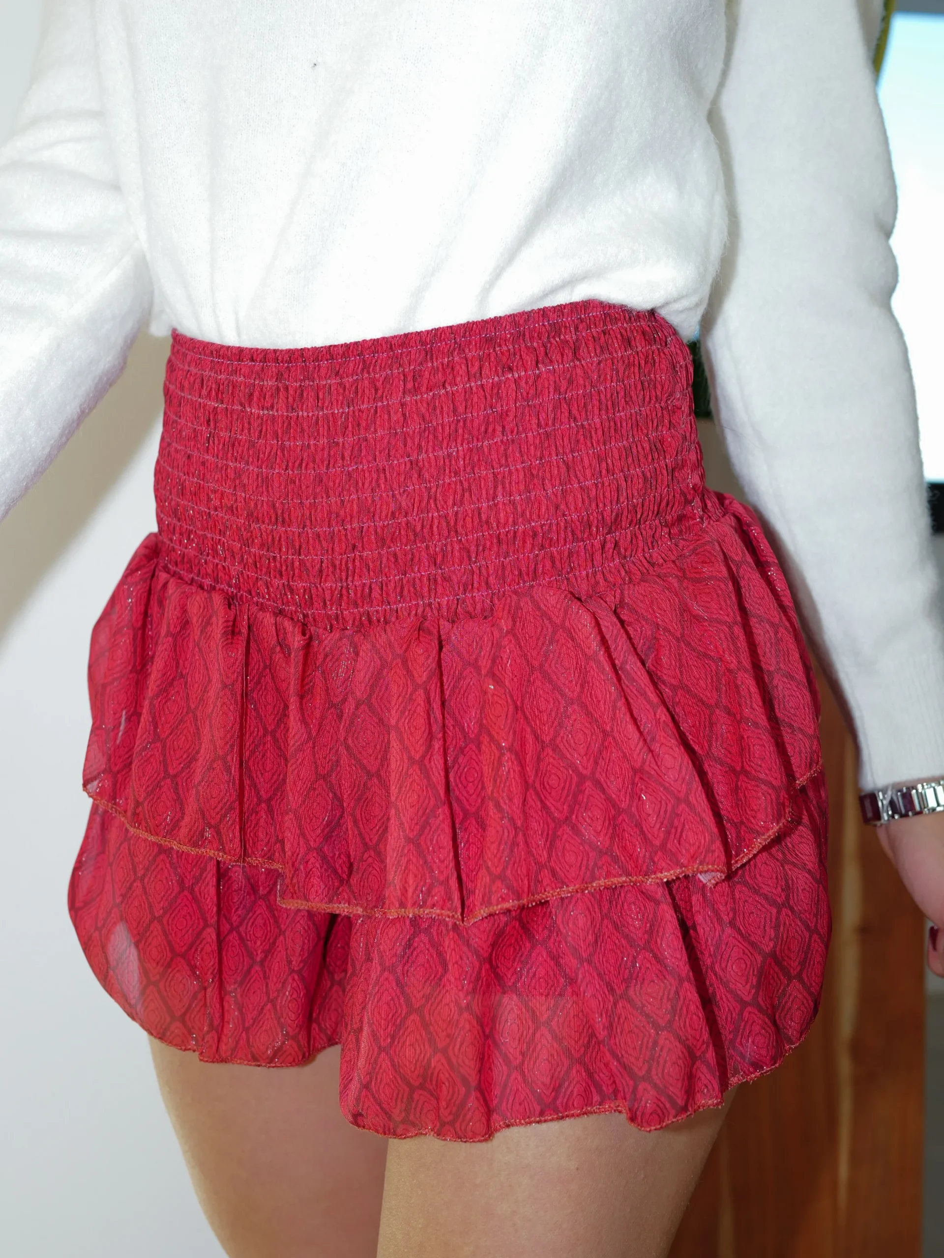 Falda mini nido estampada burdeos