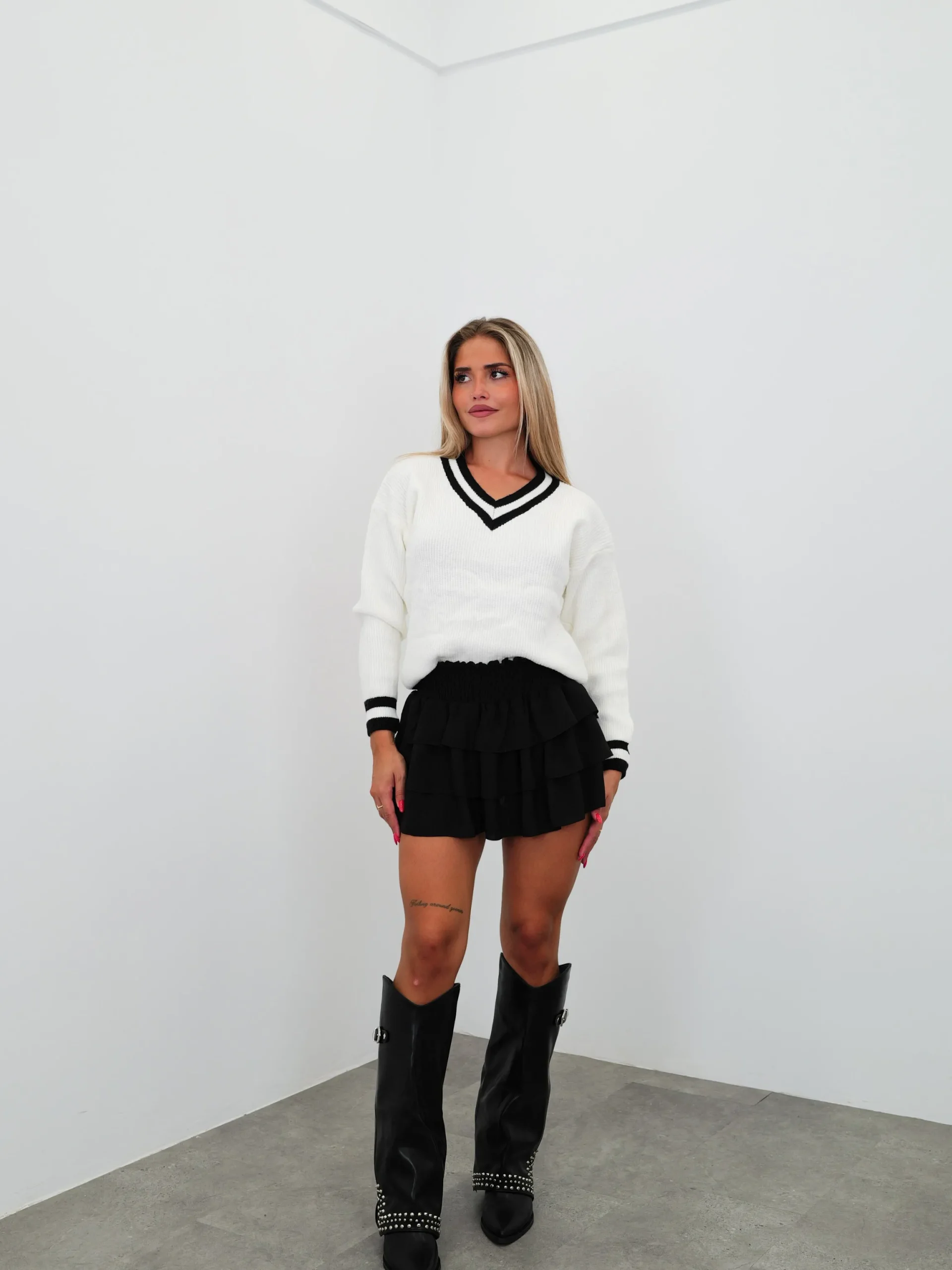 Falda mini nido volantes negro