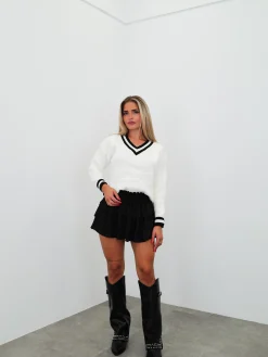 Falda mini nido volantes negro